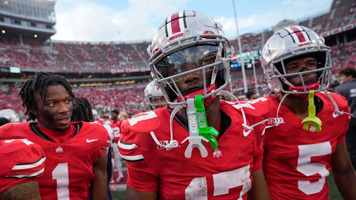 Aug 31, 2024; Columbus, OH, USA; Ohio State Buckeyes wide receiver Carnell Tate (17) walks off the field following the NCAA football game against the Akron Zips at Ohio Stadium. Ohio State won 52-6.