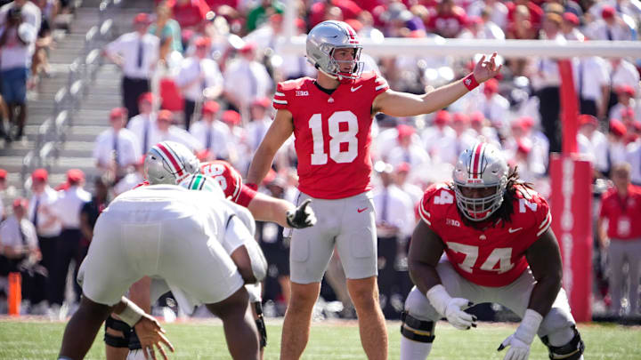 Sep 21, 2024; Columbus, Ohio, USA; Ohio State Buckeyes quarterback Will Howard (18) speaks to his teammates in the second half at Ohio Stadium on Saturday.
