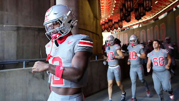 Oct 5, 2024; Columbus, OH, USA; Ohio State Buckeyes safety Caleb Downs (2) takes the field wearing an all-gray colored uniform prior to the NCAA football game against the Iowa Hawkeyes at Ohio Stadium.