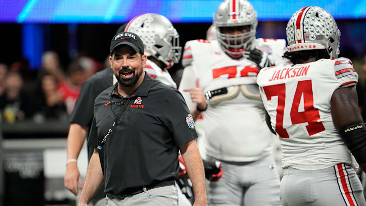 Ohio State Buckeyes head football coach Ryan Day leads his team in warmups prior to the Peach Bowl in the College Football Playoff semifinal, Dec 31, 2022, in Atlanta. Georgia won 42-41.

Ncaa Football Peach Bowl Ohio State At Georgia