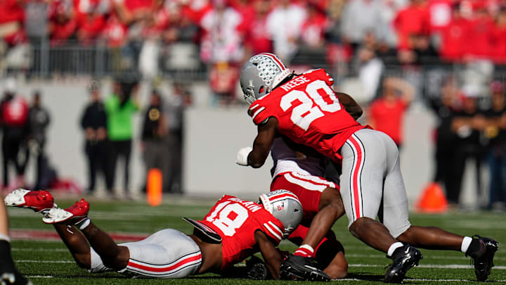 Ohio State Buckeyes linebacker Arvell Reese (20) hits Nebraska Cornhuskers wide receiver Jahmal Banks (4) during the second half of the NCAA football game at Ohio Stadium in Columbus on Saturday, Oct. 26, 2024. Reese was called for targeting on the play. Ohio State won 21-17.