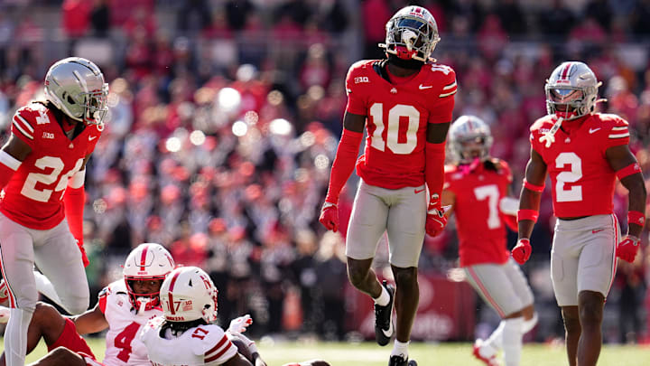 Ohio State Buckeyes cornerback Denzel Burke (10) celebrates a tackle of Nebraska Cornhuskers wide receiver Jacory Barney Jr. (17) during the first half of the NCAA football game at Ohio Stadium in Columbus on Saturday, Oct. 26, 2024.