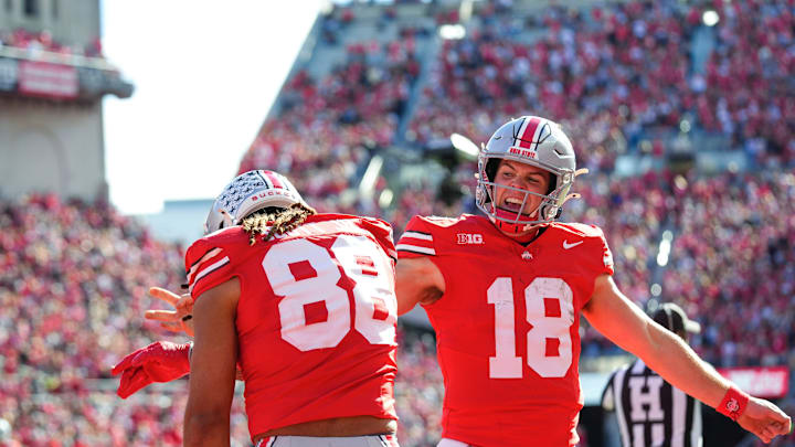 Ohio State Buckeyes quarterback Will Howard (18) celebrates with tight end Gee Scott Jr. (88) after Scott scored a touchdown in the first half at Ohio Stadium on Saturday, Nov. 9, 2024 in Columbus, Ohio.