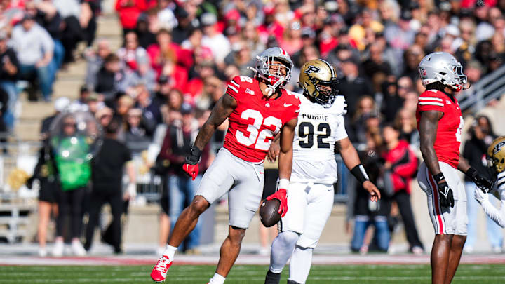 Ohio State Buckeyes running back TreVeyon Henderson (32) celebrates in the first half at Ohio Stadium on Saturday, Nov. 9, 2024 in Columbus, Ohio.