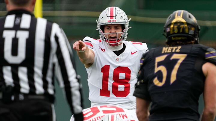 Ohio State Buckeyes quarterback Will Howard (18) calls out the defense during the NCAA football game against the Northwestern Wildcats at Wrigley Field in Chicago on Monday, Nov. 18, 2024. Ohio State won 31-7.