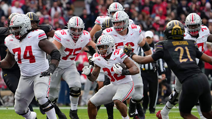Ohio State running back TreVeyon Henderson (32) runs upfield during a game against Northwestern on Nov. 16, 2024.