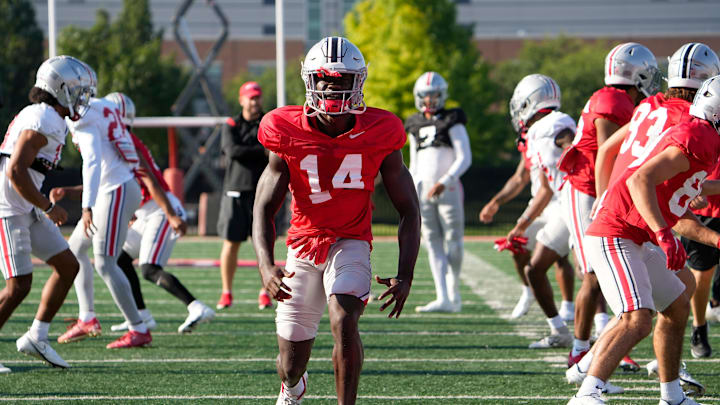 Aug 11, 2022; Columbus, OH, USA;  Ohio State Buckeyes wide receiver Kojo Antwi (14) stretches during football camp at the Woody Hayes Athletic Center. Mandatory Credit: Adam Cairns-The Columbus Dispatch

Ohio State Football Camp