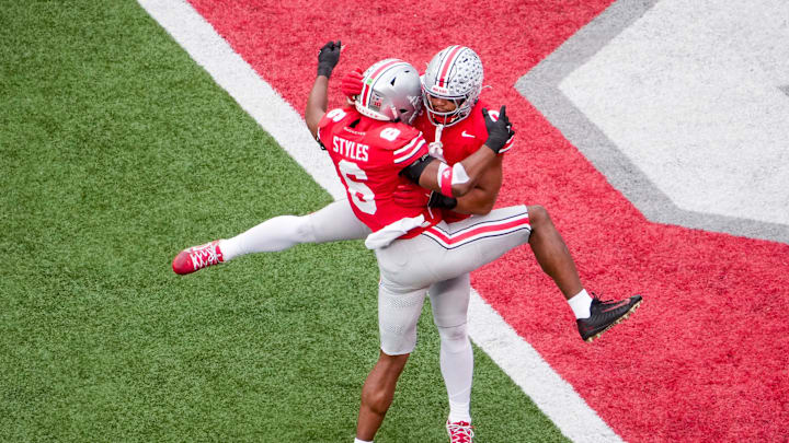 Ohio State Buckeyes safety Sonny Styles (6) celebrates with linebacker Cody Simon (0) in the first half at Ohio Stadium on Saturday, Nov. 23, 2024 in Columbus, Ohio.