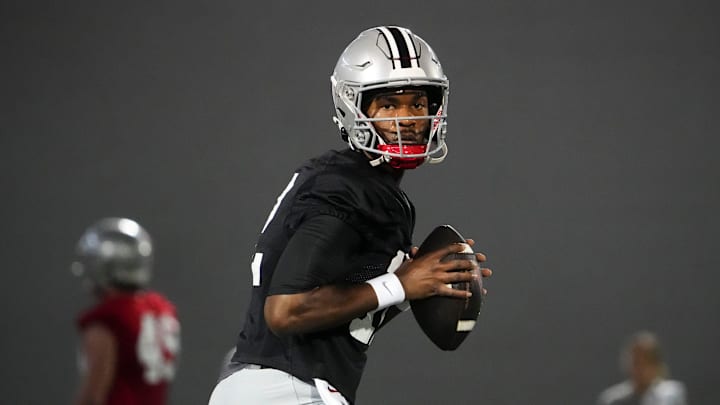 Mar 7, 2024; Columbus, OH, USA; Ohio State Buckeyes quarterback Air Noland (12) looks to throw during spring football practice at the Woody Hayes Athletic Center.