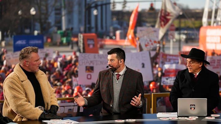 Ohio State head coach Ryan Day talks with Pat McAfee and Nick Saban on the set of ESPN College GameDay prior to the College Football Playoff first round game between the Ohio State Buckeyes and Tennessee Volunteers in Columbus on Dec. 21, 2024.