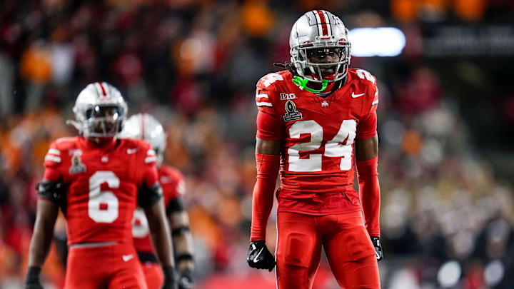 Ohio State Buckeyes cornerback Jermaine Mathews Jr. (24) celebrates a tackle during the second half of the College Football Playoff first round game against the Tennessee Volunteers at Ohio Stadium in Columbus on Dec. 22, 2024. Ohio State won 42-17.