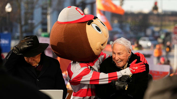 Ohio State mascot Brutus interacts with Lee Corso on the set of ESPN College GameDay prior to the College Football Playoff first round game between the Ohio State Buckeyes and Tennessee Volunteers in Columbus on Dec. 21, 2024.