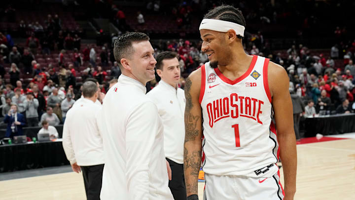 Mar 19, 2024; Columbus, OH, USA; Ohio State Buckeyes head coach Jake Diebler congratulates guard Roddy Gayle Jr. (1) following their 88-83 win over the Cornell Big Red in the NIT basketball game at Value City Arena.