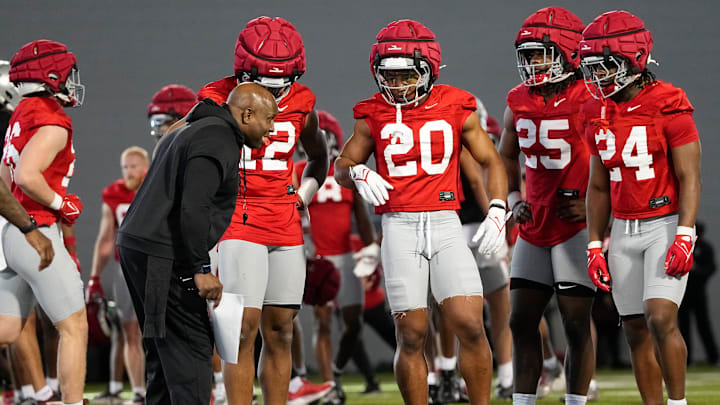 Ohio State Buckeyes running backs coach Carlos Locklyn talks to running backs, from left, C.J. Donaldson, James Peoples, Bo Jackson and Sam Williams-Dixon during spring football practice at the Woody Hayes Athletic Center on March 17, 2025.