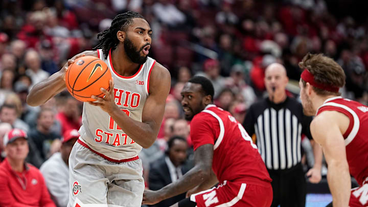 Ohio State Buckeyes guard Evan Mahaffey (12) looks to pass during the first half of the NCAA men's basketball game against the Nebraska Cornhuskers at Value City Arena in Columbus on March 4, 2025.