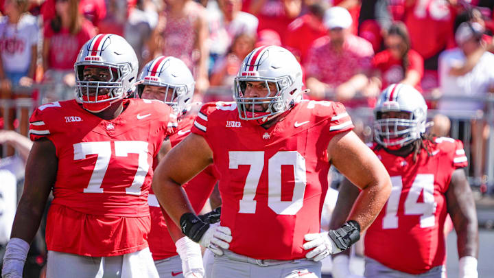 Sep 21, 2024; Columbus, Ohio, USA; Ohio State Buckeyes offensive lineman Tegra Tshabola (77), offensive lineman Josh Fryar (70) stand on the field in the second quarter at Ohio Stadium on Saturday.