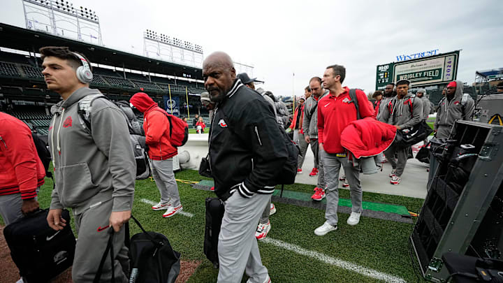 Ohio State Buckeyes defensive line coach Larry Johnson heads into the lockerroom behind the first base dugout prior to the NCAA football game between the Ohio State Buckeyes and the Northwestern Wildcats at Wrigley Field in Chicago on Saturday, Nov. 16, 2024.