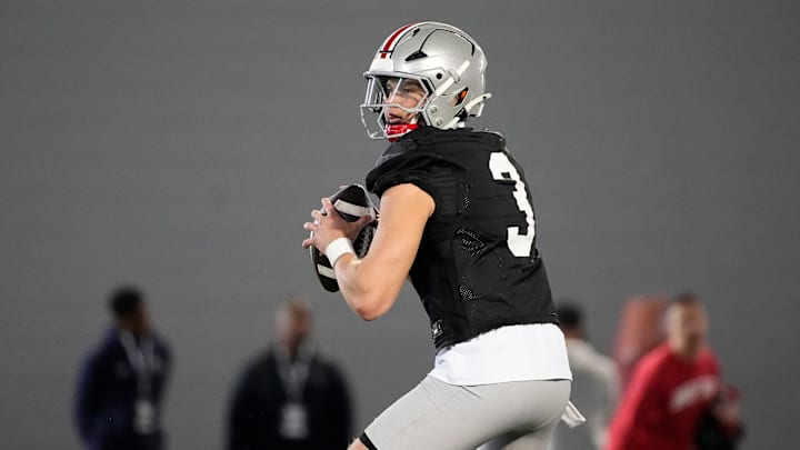 Ohio State Buckeyes quarterback Lincoln Kienholz (3) takes a snap during spring football practice at the Woody Hayes Athletic Center on March 17, 2025.