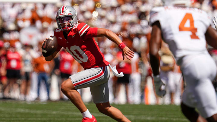 Ohio State Buckeyes quarterback Julian Sayin (10) runs during the first half of the NCAA football game against the Texas Longhorns at Ohio Stadium on Aug. 30, 2025.