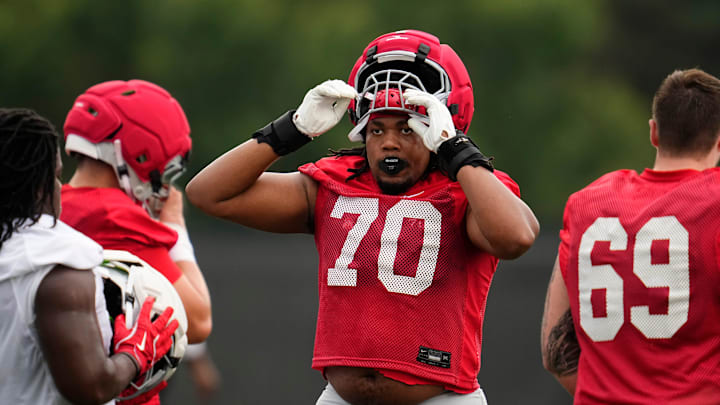 Ohio State Buckeyes offensive lineman Phillip Daniels (70) warms up during the first football practice of the season at the Woody Hayes Athletic Center on July 31, 2025.