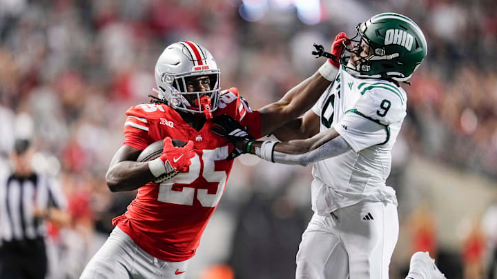 Ohio State Buckeyes running back Bo Jackson (25) stiff arms Ohio Bobcats cornerback Michael Mack II (9) during the second half of the NCAA football game at Ohio Stadium on Sept. 13, 2025. Ohio State won 37-9.