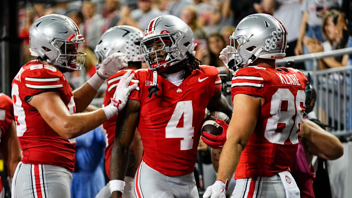 Ohio State Buckeyes wide receiver Jeremiah Smith (4) celebrates a touchdown during the NCAA football game against the Ohio Bobcats at Ohio Stadium on Sept. 13, 2025. Ohio State won 37-9.