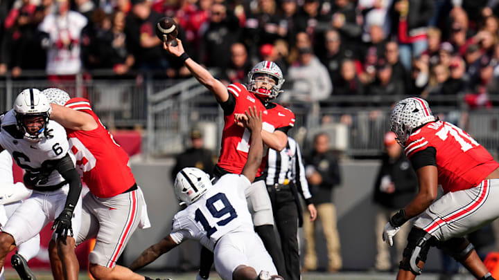 Ohio State Buckeyes quarterback Julian Sayin (10) throws a long touchdown pass to Carnell Tate during the NCAA football game against the Penn State Nittany Lions at Ohio Stadium in Columbus on Nov. 1, 2025.