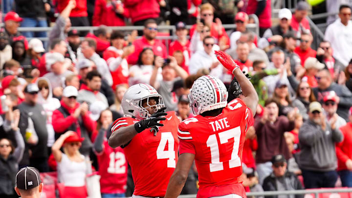 Ohio State Buckeyes wide receiver Jeremiah Smith (4) celebrates with wide receiver Carnell Tate (17) after Smith scored a touchdown in the first half at Ohio Stadium on Saturday, Nov. 9, 2024 in Columbus, Ohio.