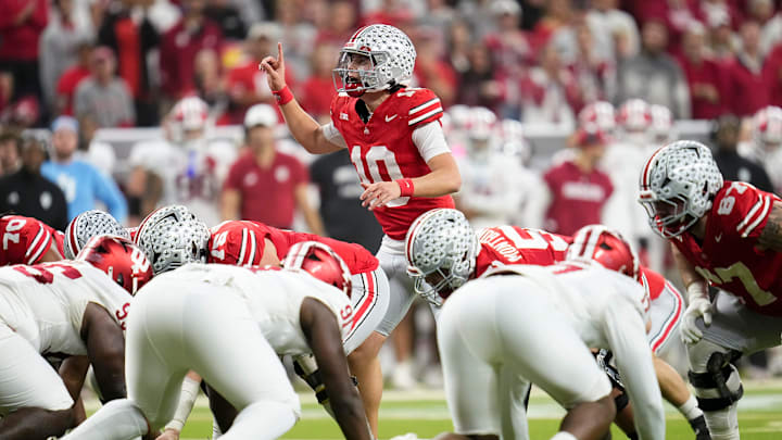 Ohio State Buckeyes quarterback Julian Sayin (10) signals during the first half of the Big Ten Conference championship game against the Indiana Hoosiers at Lucas Oil Stadium in Indianapolis on Dec. 6, 2025. Ohio State Buckeyes quarterback Julian Sayin (10) signals during the first half of the Big Ten Conference championship game against the Indiana Hoosiers at Lucas Oil Stadium in Indianapolis on Dec. 6, 2025.