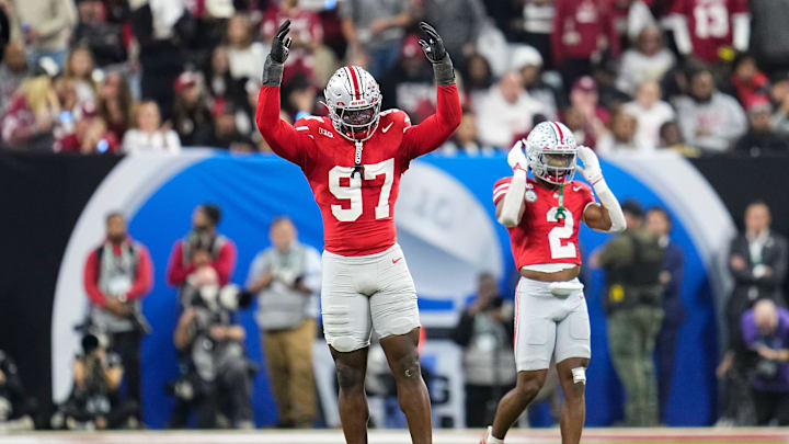 Ohio State Buckeyes defensive end Kenyatta Jackson Jr. (97) celebrates during the first half of the Big Ten Conference championship game against the Indiana Hoosiers at Lucas Oil Stadium in Indianapolis on Dec. 6, 2025.
