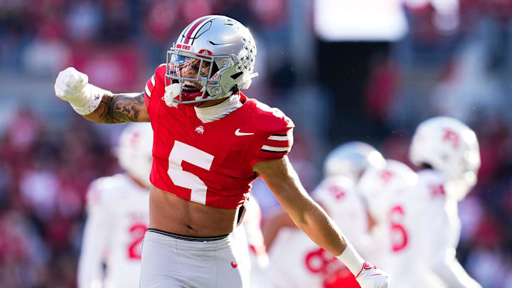 Ohio State Buckeyes cornerback Aaron Scott Jr. (5) celebrates during the second half of the NCAA football game against the Rutgers Scarlet Knights at Ohio Stadium in Columbus on Nov. 22, 2025. Ohio State won 42-9.