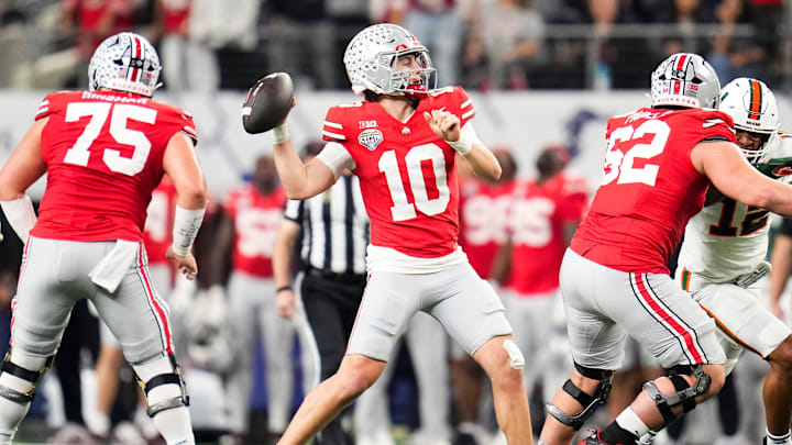 Ohio State Buckeyes quarterback Julian Sayin (10) throws during the Cotton Bowl at AT&T Stadium in Arlington, Texas for the College Football Playoff quarterfinal game against the Miami Hurricanes on Dec. 31, 2025. Ohio State Buckeyes quarterback Julian Sayin (10) throws during the Cotton Bowl at AT&T Stadium in Arlington, Texas for the College Football Playoff quarterfinal game against the Miami Hurricanes on Dec. 31, 2025.
