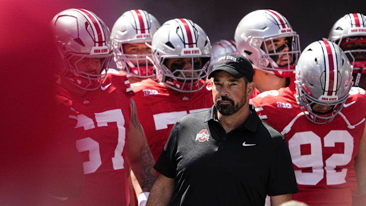 Ohio State Buckeyes head coach Ryan Day leads his team onto the field prior to the NCAA football game against the Texas Longhorns at Ohio Stadium on Aug. 30, 2025.