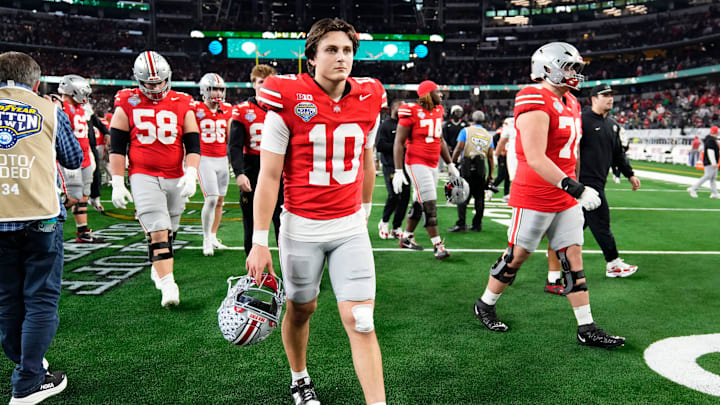 Ohio State Buckeyes quarterback Julian Sayin (10) leaves the field following the Cotton Bowl at AT&T Stadium in Arlington, Texas for the College Football Playoff quarterfinal game against the Miami Hurricanes on Dec. 31, 2025. Ohio State lost 24-14.