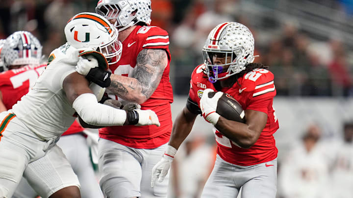 Ohio State Buckeyes running back Bo Jackson (25) runs during the Cotton Bowl at AT&T Stadium in Arlington, Texas for the College Football Playoff quarterfinal game against the Miami Hurricanes on Dec. 31, 2025. Ohio State lost 24-14.