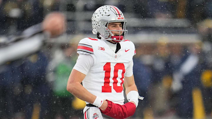 Ohio State Buckeyes quarterback Julian Sayin (10) smiles as he walks off the field following the NCAA football game against the Michigan Wolverines at Michigan Stadium in Ann Arbor, Mich. on Nov. 29, 2025. Ohio State won 27-9.