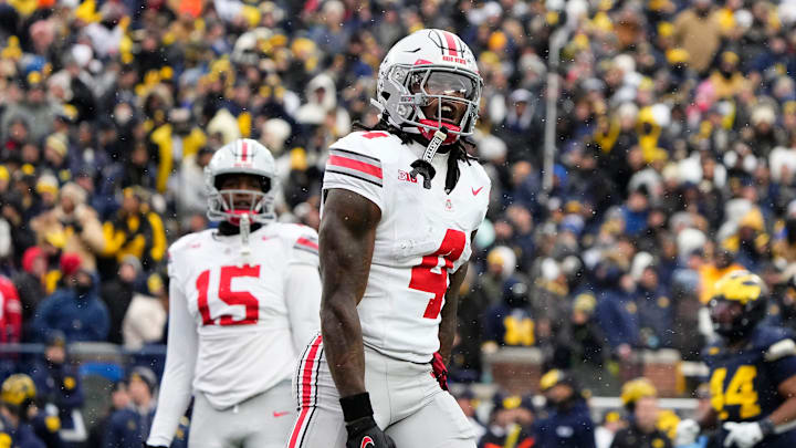 Ohio State Buckeyes wide receiver Jeremiah Smith (4) celebrates a touchdown during the NCAA football game against the Michigan Wolverines at Michigan Stadium in Ann Arbor, Mich. on Nov. 29, 2025.