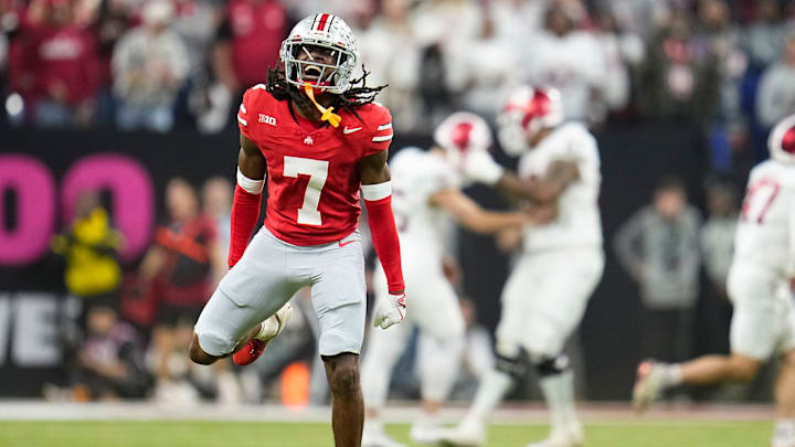 Ohio State Buckeyes cornerback Jermaine Mathews Jr. (7) celebrates a missed field goal by Indiana Hoosiers kicker Nicolas Radicic (15) during the first half of the Big Ten Conference championship game at Lucas Oil Stadium in Indianapolis on Dec. 6, 2025.