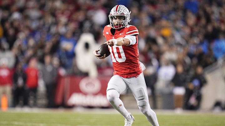 Ohio State Buckeyes quarterback Julian Sayin (10) runs during the NCAA football game against the UCLA Bruins at Ohio Stadium in Columbus on Nov. 15, 2025.
