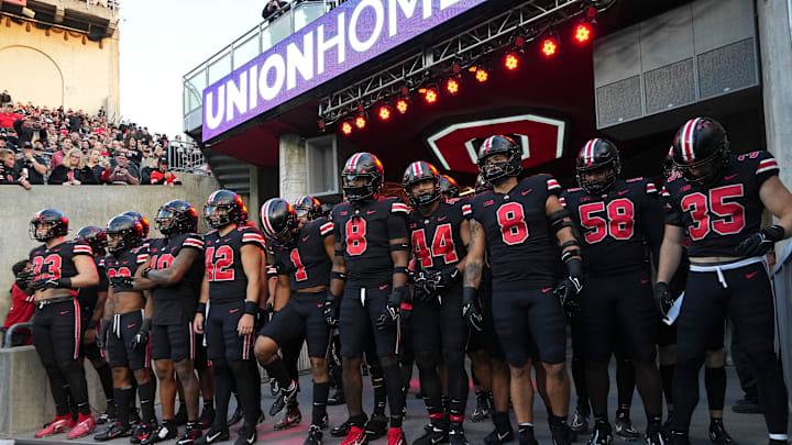 Sep 24, 2022; Columbus, Ohio, USA; Wearing black uniforms, the Ohio State Buckeyes prepare to take the field for warm-ups prior to the NCAA Division I football game against the Wisconsin Badgers at Ohio Stadium. Mandatory Credit: Adam Cairns-The Columbus Dispatch

Ncaa Football Wisconsin Badgers At Ohio State Buckeyes