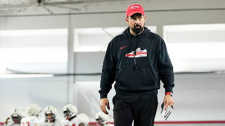 Ohio State Buckeyes head coach Ryan Day walks behind the huddle during Student Appreciation Day spring practice at the Woody Hayes Athletic Center on April 4, 2026. Ohio State Buckeyes head coach Ryan Day walks behind the huddle during Student Appreciation Day spring practice at the Woody Hayes Athletic Center on April 4, 2026.