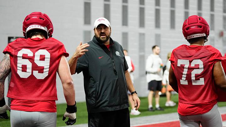Ohio State Buckeyes offensive line coach Tyler Bowen talks to linemen Ian Moore and Deontae Armstrong during the first day of spring workouts for the 2026 football season at Woody Hayes Athletic Complex in Columbus on March 10, 2026.