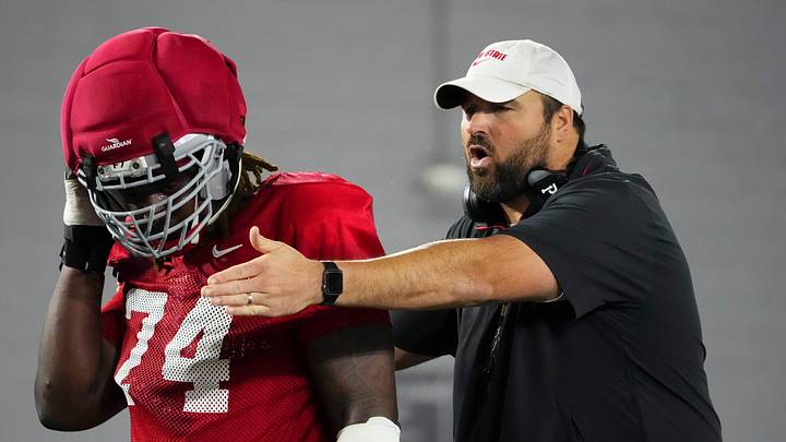 Ohio State Buckeyes offensive line coach Tyler Bowen talks to offensive lineman Carter Lowe (74) during Student Appreciation Day spring practice at the Woody Hayes Athletic Center on April 4, 2026.