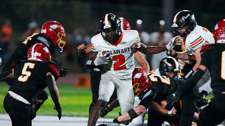 Sep 13, 2024; Sunbury, Ohio, USA; Delaware Hayes Favour Akih (2) runs the ball against Big Walnut in the second half at Big Walnut High School.