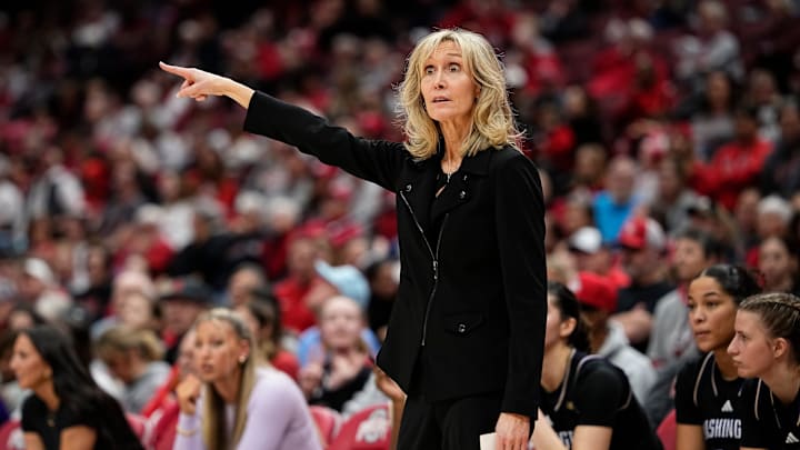 Washington Huskies head coach Tina Langley motions during the first half of the NCAA women's basketball game against the Ohio State Buckeyes at Value City Arena in Columbus on Feb. 2, 2025. Washington Huskies head coach Tina Langley motions during the first half of the NCAA women's basketball game against the Ohio State Buckeyes at Value City Arena in Columbus on Feb. 2, 2025.