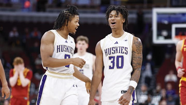 Mar 11, 2026; Chicago, IL, USA; Washington Huskies guard Quimari Peterson (0) and guard Courtland Muldrew (30) celebrate team's win against the Southern California Trojans at United Center. Mandatory Credit: Kamil Krzaczynski-Imagn Images Mar 11, 2026; Chicago, IL, USA; Washington Huskies guard Quimari Peterson (0) and guard Courtland Muldrew (30) celebrate team's win against the Southern California Trojans at United Center. Mandatory Credit: Kamil Krzaczynski-Imagn Images