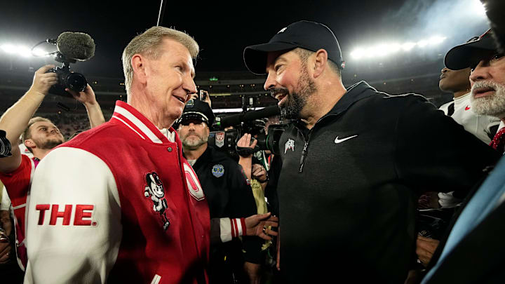 Ohio State president Ted Carter congratulates head coach Ryan Day following the 41-21 win over the Oregon Ducks in the College Football Playoff quarterfinal at the Rose Bowl in Pasadena, Calif. on Jan. 1, 2025.