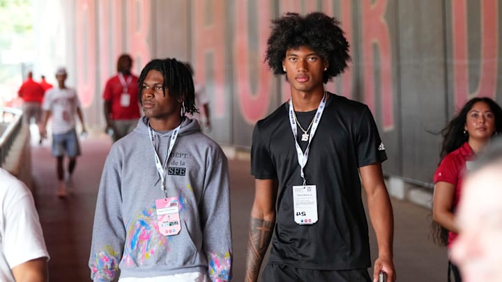 Aug 31, 2024; Columbus, OH, USA; Ohio State Buckeyes recruits Kayden Dixon-Wyatt and Chris Henry Jr. walk onto the field prior to the NCAA football game against the Akron Zips at Ohio Stadium. Ohio State won 52-6.