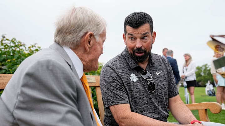 Jun 5, 2024; Columbus, Ohio, USA; Jack Nicklaus talks to Ohio State football coach Ryan Day during a practice day for the Memorial Tournament at Muirfield Village Golf Club.
