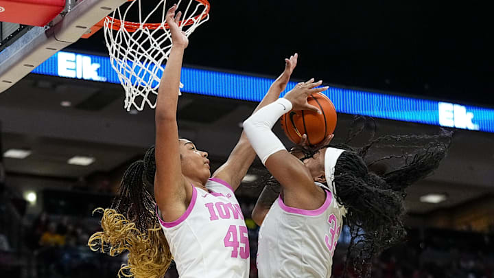 Ohio State Buckeyes forward Cotie McMahon (32) attempts to shoot the ball against Iowa Hawkeyes forward Hannah Stuelke (45) in the second half at Value City Arena on Monday, Feb. 17, 2025 in Columbus, OH.   Mandatory Credit: Samantha Madar/USA TODAY NETWORK via Imagn Images